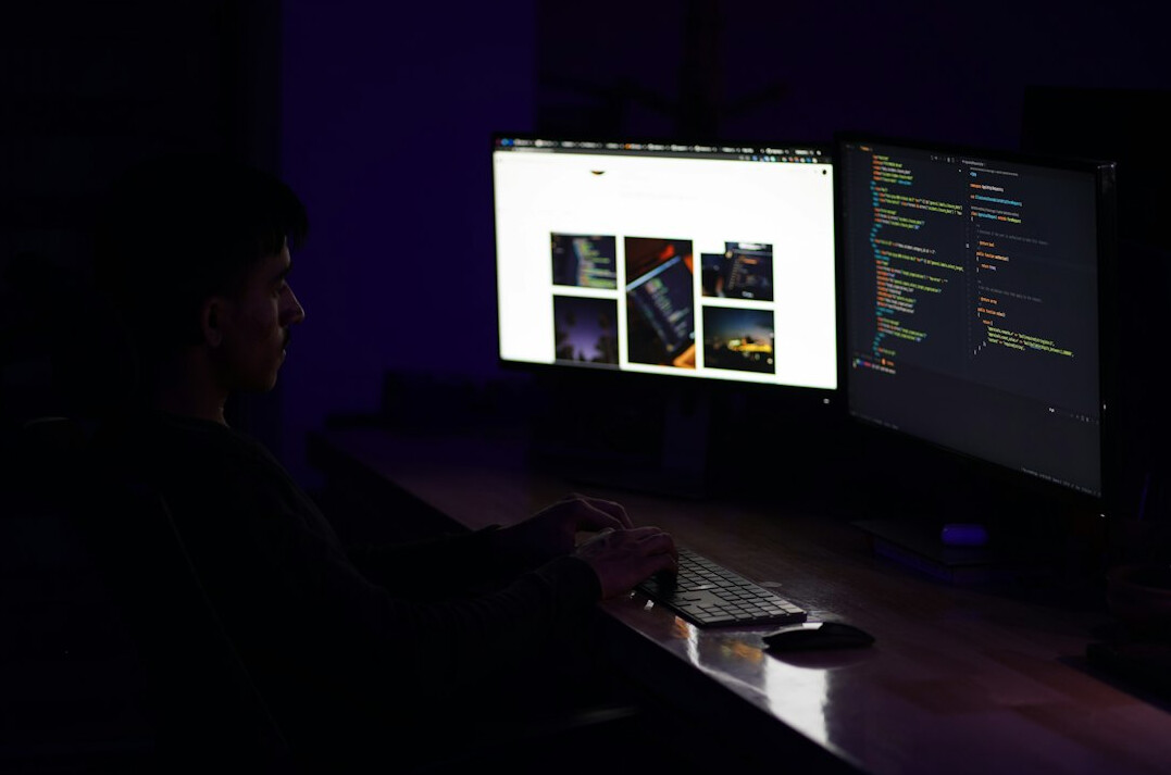 croatian student coding on laptop