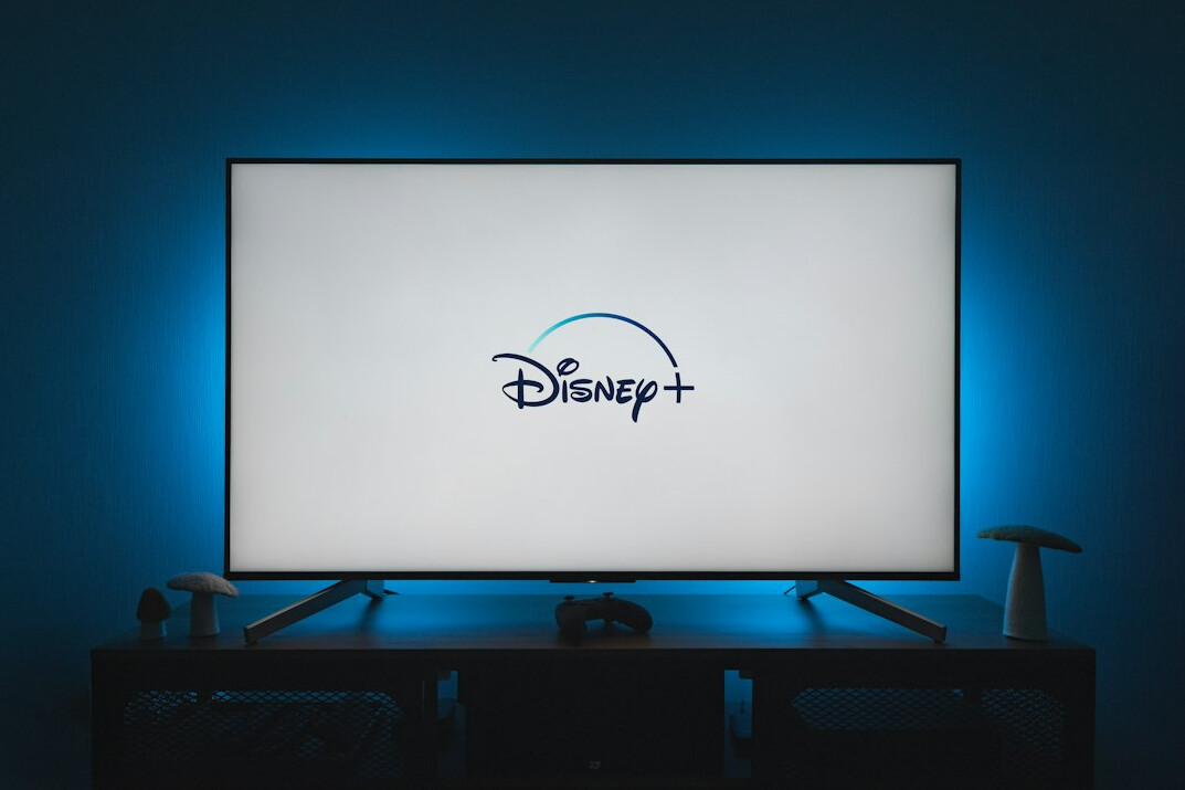 Source code on a computer monitor in a dim workspace