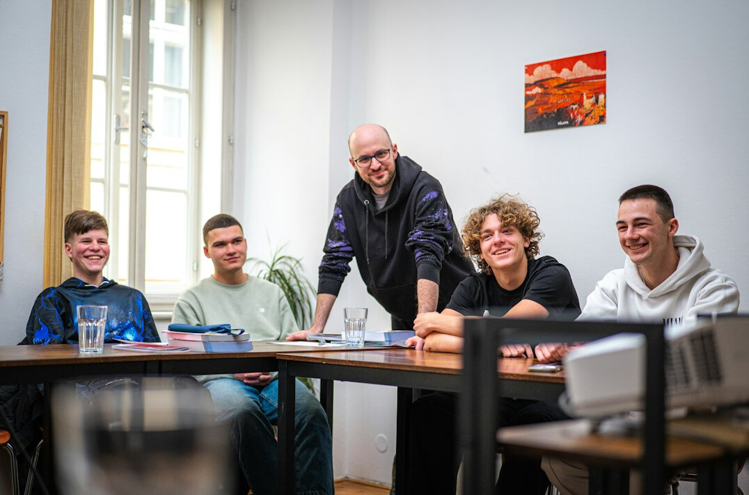 students learning coding in classroom
